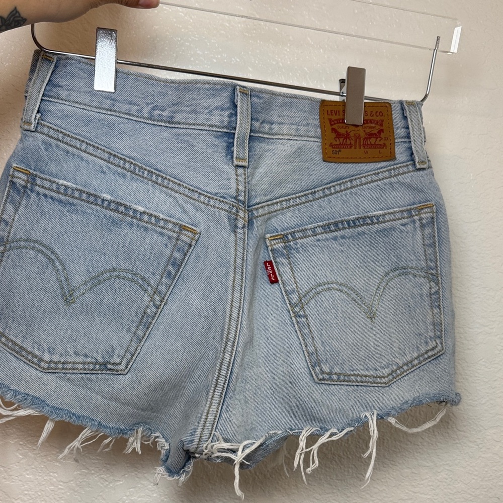 Levi's Light Wash Denim Frayed Hem Women's Cutoff Shorts
